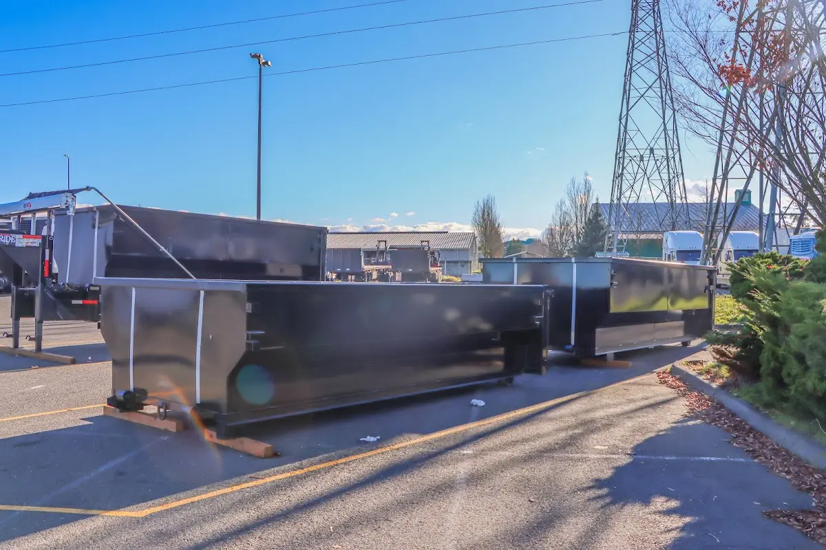 Roll-off dumpster ready for waste disposal at job site for Construction Dumpster Rental in East Moline